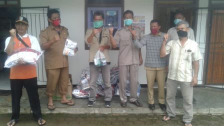 Dinas BPBD Pesawaran Berikan Bantuan Masker dan Hand Sanitizer Kepada Masyarakat